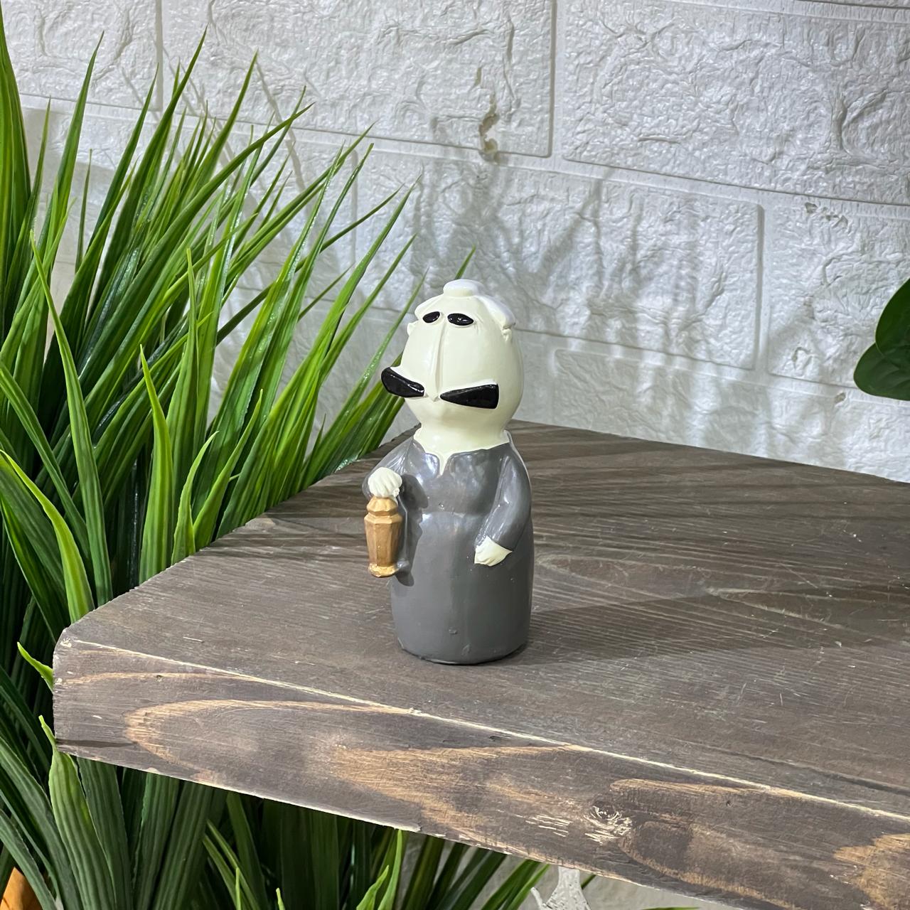 Figure with Lantern